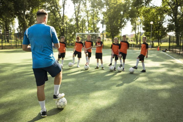 football-trainer-teaching-his-pupils (1)